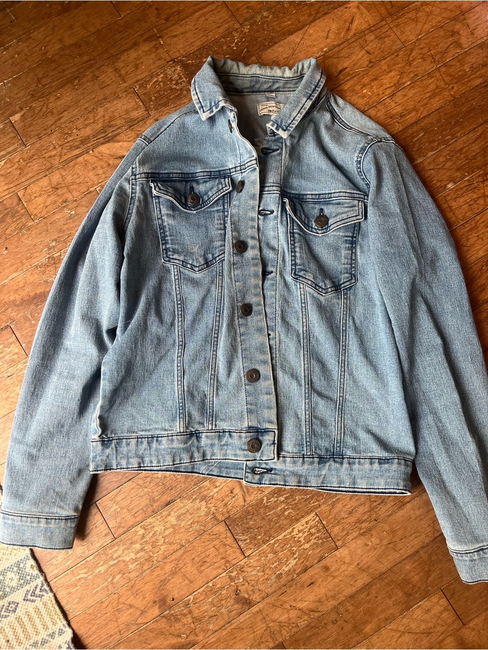 Light Blue Distressed Denim Jacket with Back Shred Detail